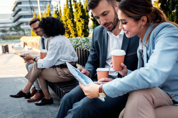 istock Group of coworkers having a coffee brake. 1346676954