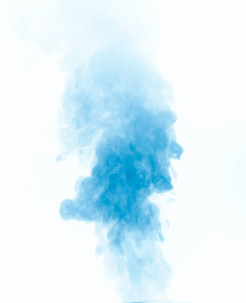 fumaça azul em um fundo branco - smoke condensation fumes isolated - fotografias e filmes do acervo