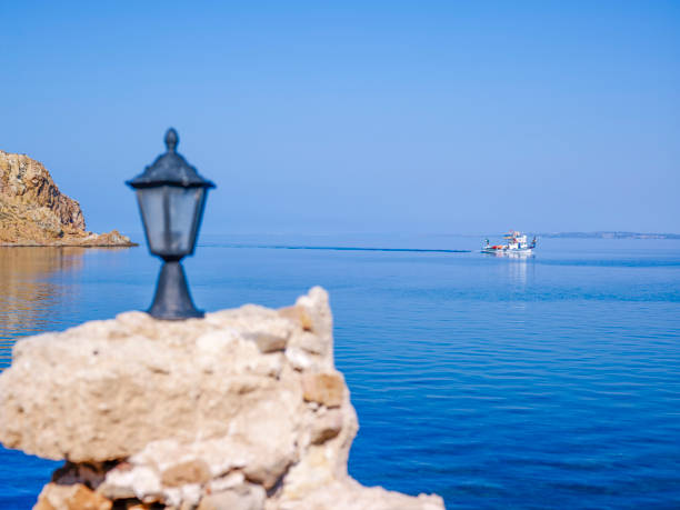 istock Fishing boat going on the sea 1346677730