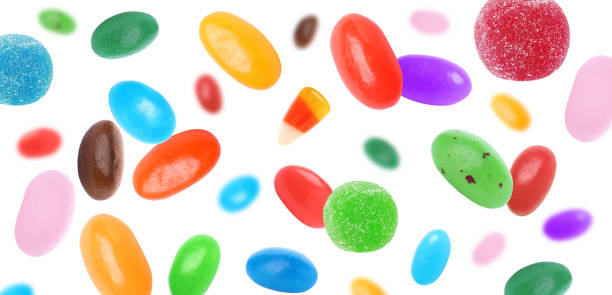 istock Set of different jelly candies falling on white background, banner design 1346679117