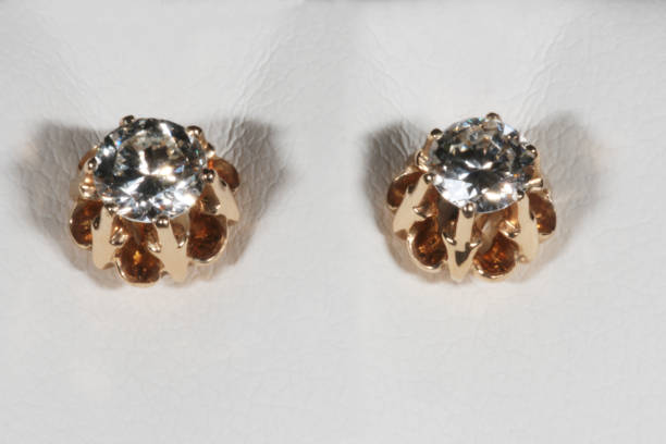 istock Rose Gold Diamond Solitaire Earrings on a white 1346679853