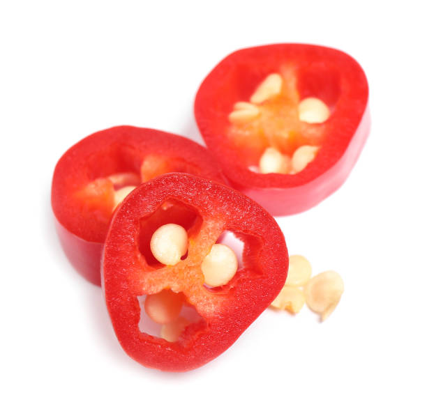 istock Cut red hot chili pepper on white background 1346681328