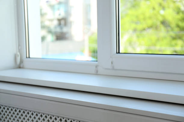 istock Closeup view of window with empty white sill 1346682258