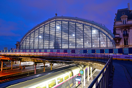 Exterior of the railway station Gare Saint-Jean in Bordeaux at night, France