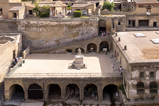 Herculaneum, Campania, Italy - June 29, 2021: Ruins of an ancient city destroyed by the eruption of the volcano Vesuvius in 79 AD near Naples, Archaeological Park of Ercolano