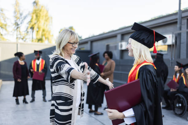 istock Female graduate with Mother 1346686798