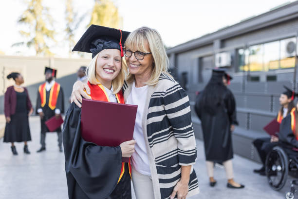 istock Female graduate with Mother 1346686828