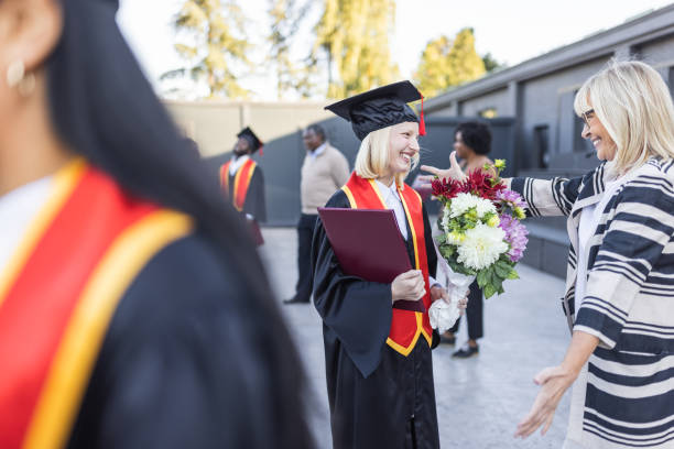 istock Female graduate with Mother 1346686858