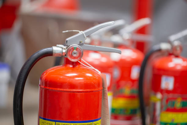 istock The red fire extinguisher is in the building for fire prevention and safety. 1346687736