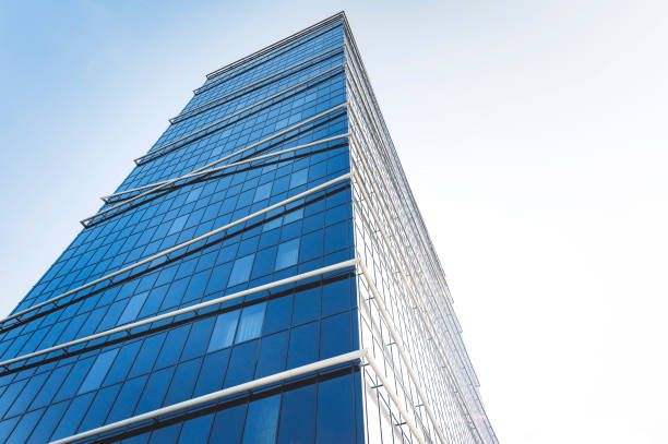 istock Looking up the edge of modern glass skyscraper 1346690891