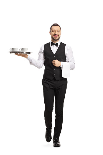 Full length portrait of a waiter serving coffee on a tray isolated on white background