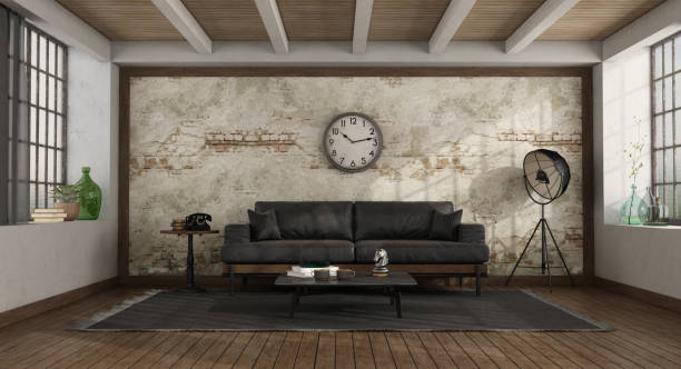 istock Vintage living room with black sofa against old wall 1346697724