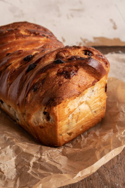istock Brioche with chocolate chips on wooden background 1346699790