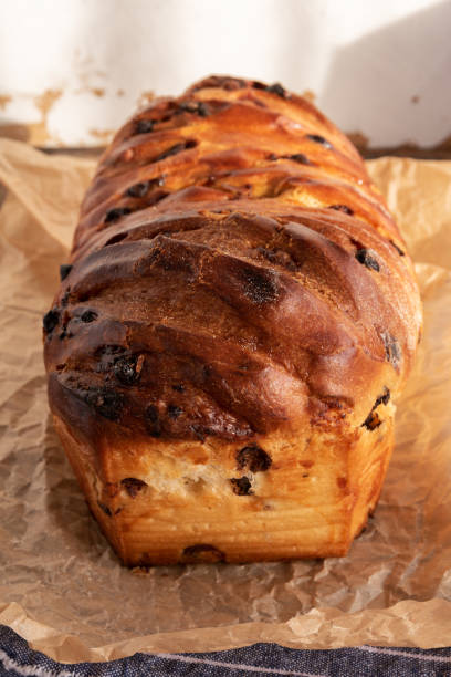 istock Brioche with chocolate chips on wooden background 1346699864