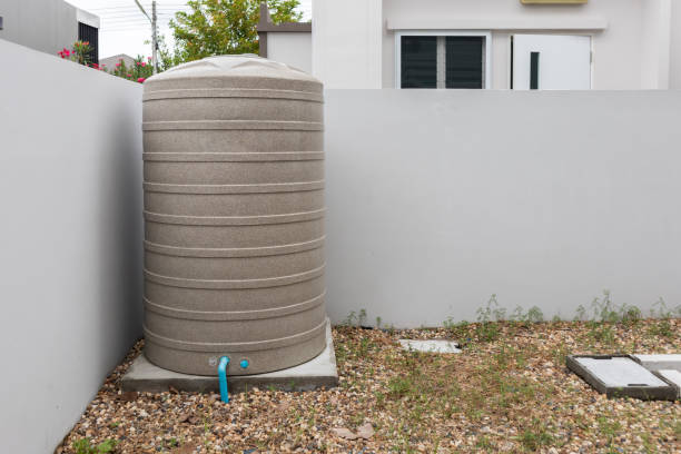 istock Water storage tank outside the house 1346700093