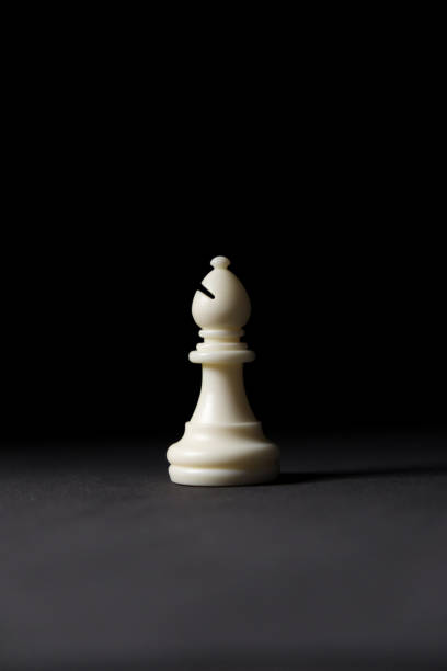 chess pieces against a dark background