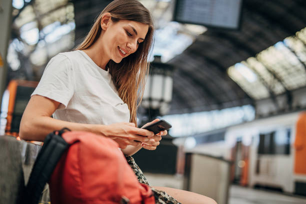 istock Woman on train station 1346702281