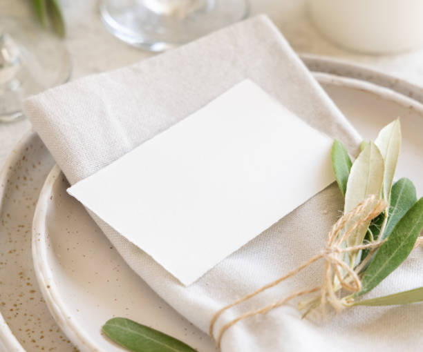 istock Wedding Table place with card decorated with olive branches 1346703840