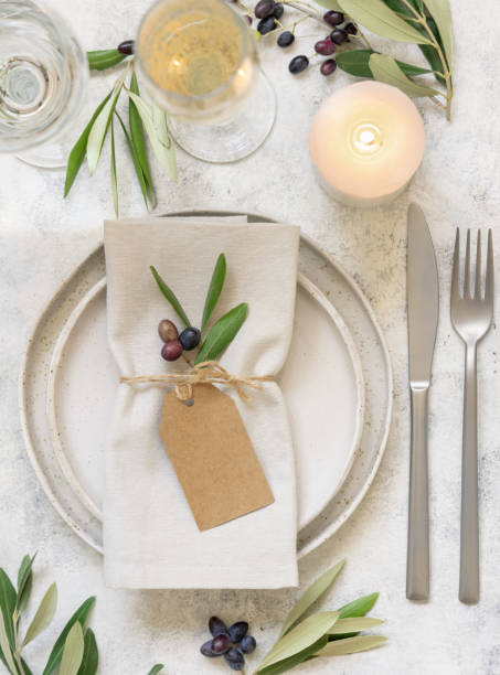 istock Wedding Table place with card decorated with olive branches 1346703846