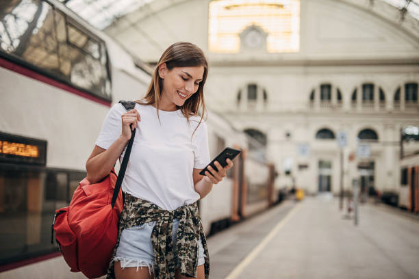 istock Woman going traveling with train 1346704869