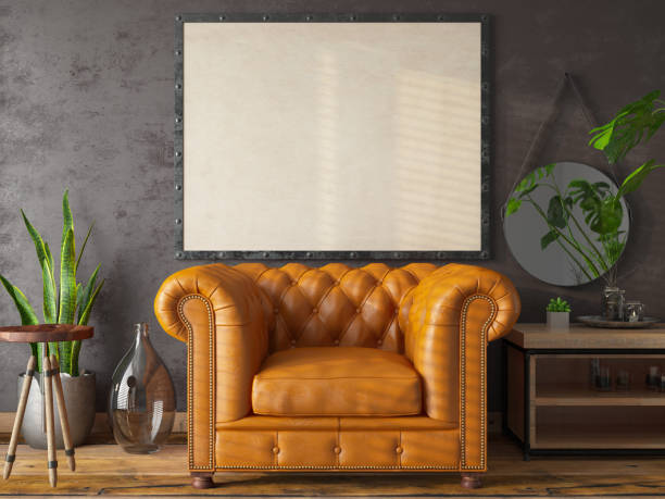 istock Cozy Room with Leather Armchair and Empty Picture Frame 1346705288