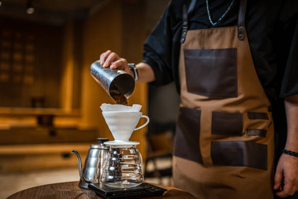 istock Close up of hand brewing coffee 1346710301