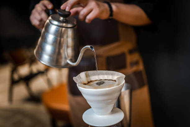 istock Close up of hand brewing coffee 1346710304