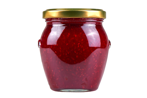 Jam in glass jar isolated on white with clipping path. Studio shot