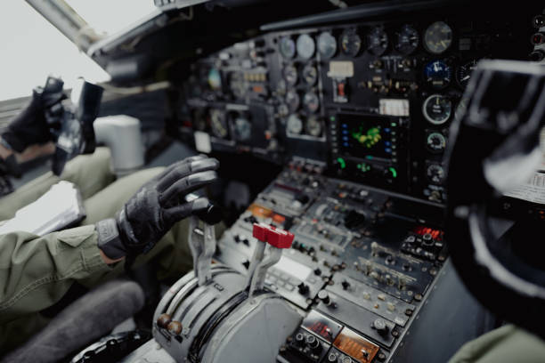 istock Defocused , Pilot operating the airplane , inspiration , leader and responsibility concept 1346713532