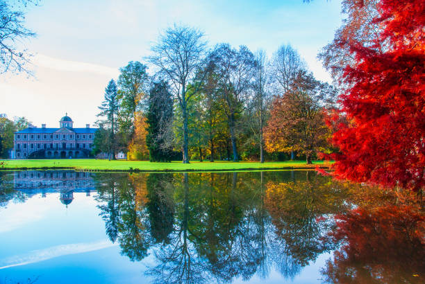 Beautiful park of Schloss Favorite, Germany, which glows in red autumn colors