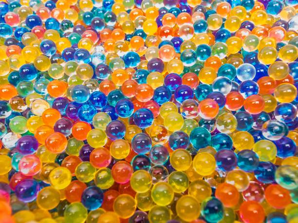 gran cantidad de burbujas de colores - glass bead fotografías e imágenes de stock