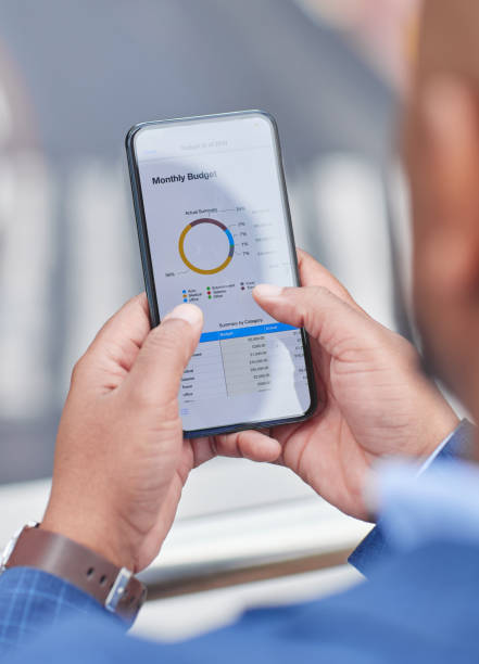 istock Cropped shot an unrecognizable businessman using his cellphone outside 1346717795