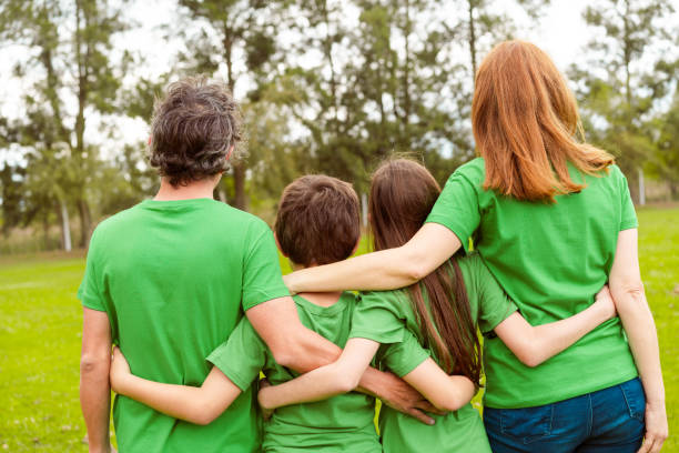 istock Family at park during environmental cleanup 1346718077