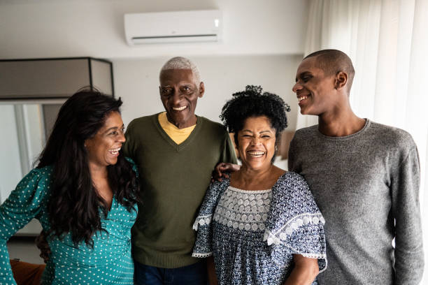 istock Happy family at home 1346718980