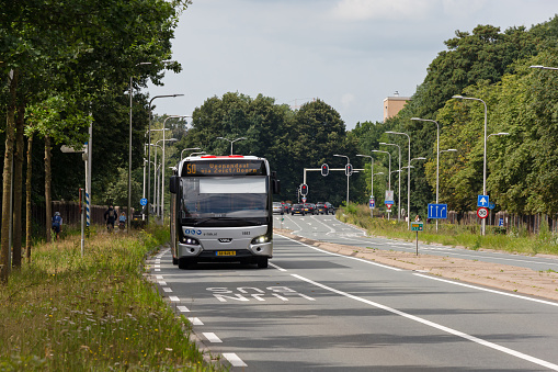 Utrecht, province of Utrecht, Netherlands, august 13th 2021, a Dutch 2017 VDL Citea LLE-120/255 bus approaching on a bus lane in the Biltsestraatweg in Utrecht, capitol of the province of Utrecht - The VDL Citea is a city bus built by Dutch, Valkenswaard based \