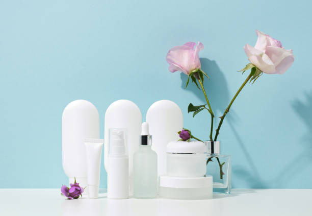 istock empty white plastic tubes and jars for cosmetics. Packaging for cream, gel, serum, advertising and product promotion, mock up 1346732928