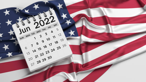 istock White-colored June calendar page and the American flag. 1346733770