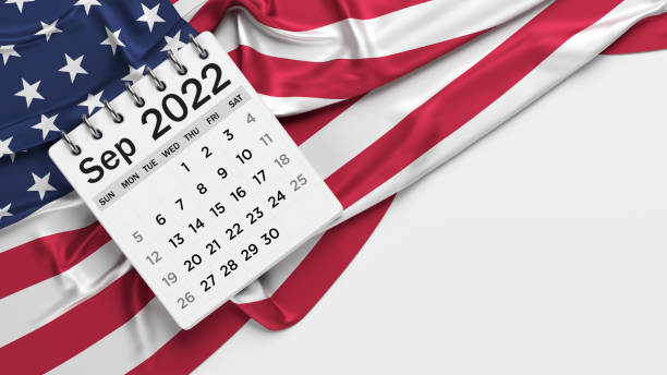 istock White-colored September calendar page and the American flag. 1346733859