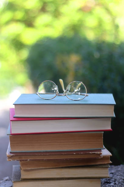 istock Vintage Books and Reading Glasses 1346734100