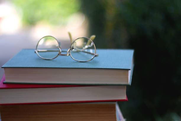 istock Vintage Books and Reading Glasses 1346734107