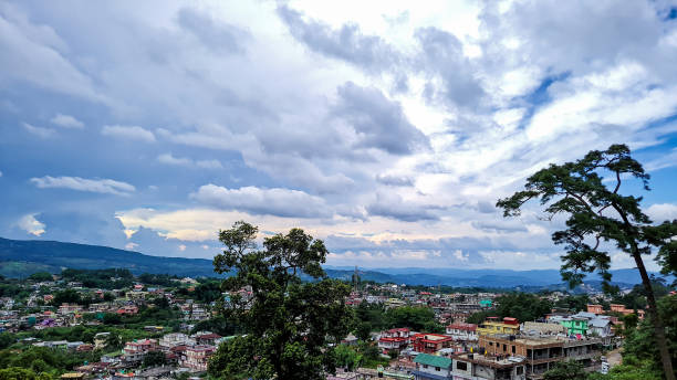 istock city urbanization view with mountain range at background at morning from flat angle 1346734268