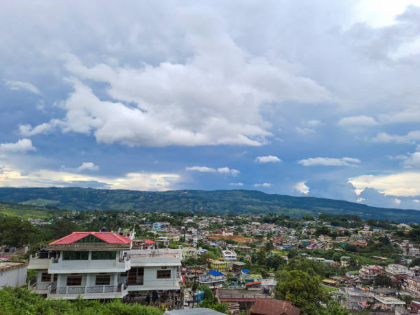 istock city urbanization view with mountain range at background at morning from flat angle 1346735062