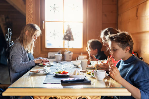 Family enjoying eating breakfast  together