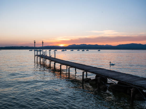 istock Lake Garda Jetty at Sunset 1346744209