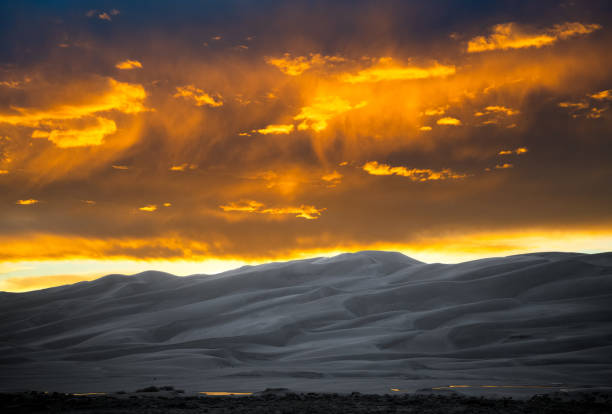 Great Sand Dunes Sunset Sunset at Great Sand Dunes National Park, Colorado great sand dunes national park stock pictures, royalty-free photos & images