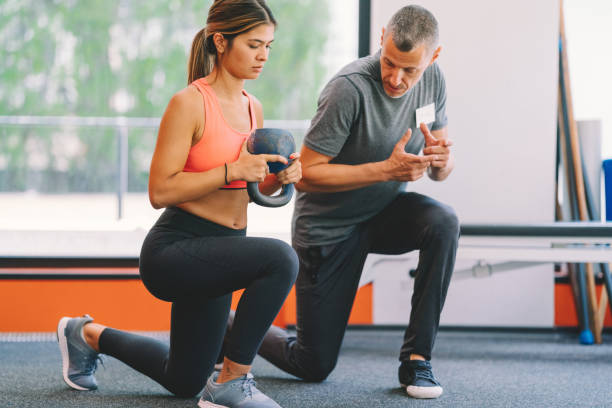 istock Sports training with personal trainer 1346747964