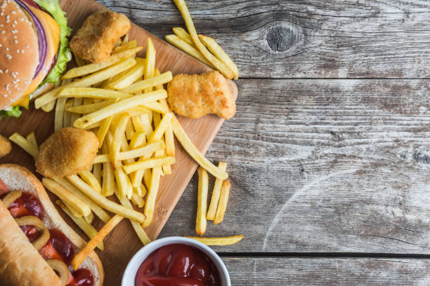istock Fast food on the wood 1346752126