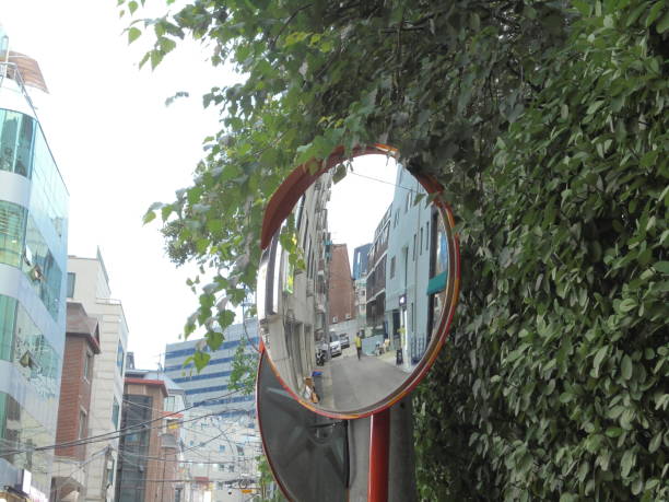 istock It is a mirror reflector installed on the road in a residential area. 1346753351