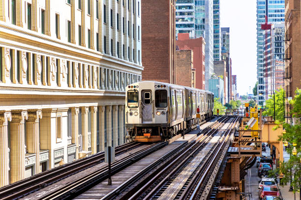 Train in Chicago Train subway in Chicago in a sunny day, Illinois, USA chicago neighborhoods stock pictures, royalty-free photos & images