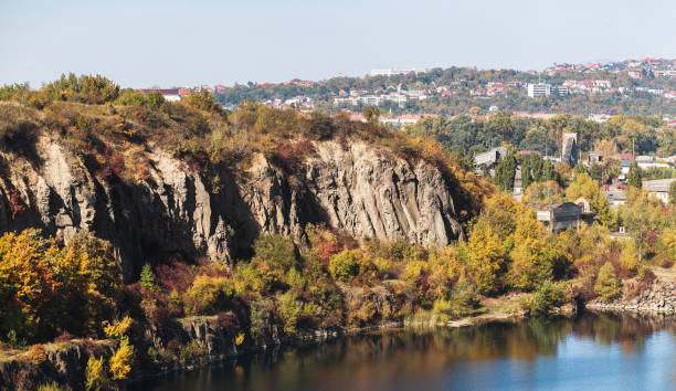 istock Old flooded quarry in autumn 1346766836
